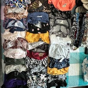 33 shirts all different style and brands some are nwt others are like new. M/L